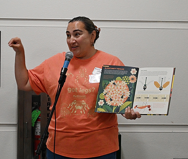 UC Davis alumna Nazzy Pakpour, who holds a doctorate microbiology, virology and parasitology from the University of Pennsylvania, reads from her children's book, 