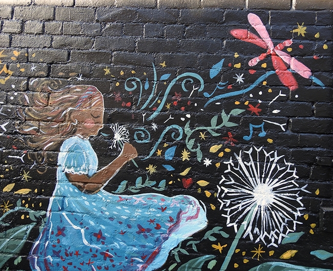 Virginia-based artist Cheyenne Renee Marcus painted this mural at the corner of Main and Elizabeth streets, Vacaville, in 2022. It's a main attraction. (Photo by Kathy Keatley Garvey)