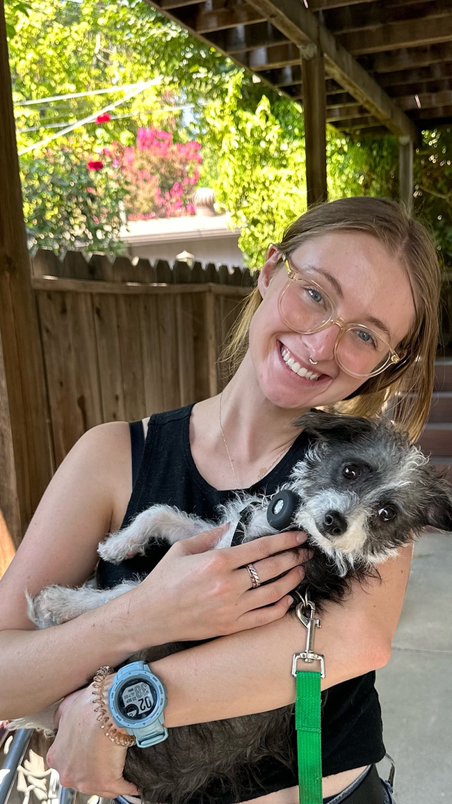 UC Davis doctoral student Grace Horne with her dog, Skipper.