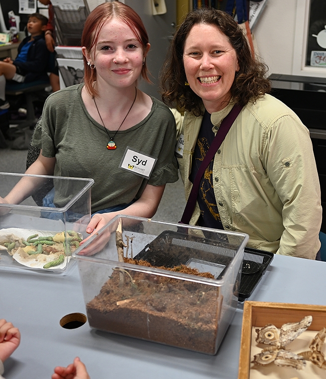 Tabatha Yang (right), the Bohart Museum's education and outreach coordinator, with high school intern Syd Benson of Met Sacramento. She just completed her internship. (Photo by Kathy Keatley Garvey)