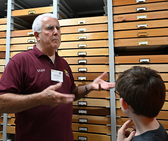 Jeff Smith, curator of the Lepidoptera collection at the Bohart Museum, answers a question about moths. (Photo by Kathy Keatley Garvey)