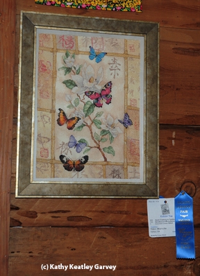 Yoko Warncke of Vallejo crated this butterfly cross-stich. (Photo by Kathy Keatley Garvey