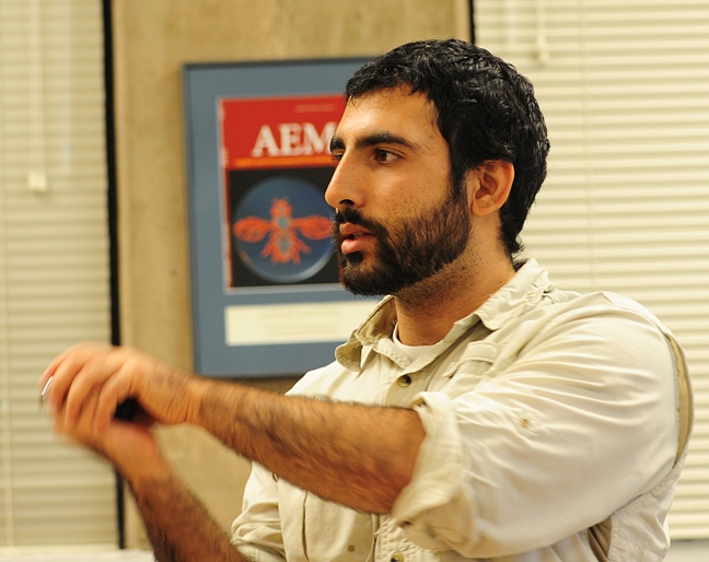Mohammad-Amir Aghaee, captain of the UC Davis debate team, leads a discussion at a practice Nov. 13 in Briggs Hall, UC Davis Department of Entomology and Nematology. (Photo by Kathy Keatley Garvey)