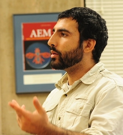 Mohammad-Amir Aghaee leading the UC Davis debate team in a practice session for the 2014 Entomological Society of America meeting. The team won the national championship. (Photo by Kathy Keatley Garvey)