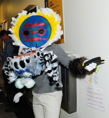 Wade Spencer, dressed as a peacock jumping spider, gets ready for a pinata game at the Bohart Museum Halloween party. (Photo by Kathy Keatley Garvey)