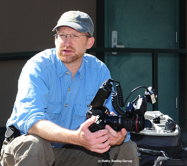 John Abbott discusses camera equipment for macro photography at BugShot Hastings. (Photo by Kathy Keatley Garvey)