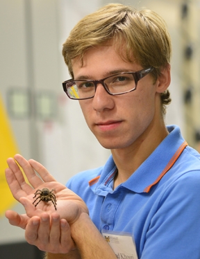 Ziad Khouri, graduate student in entomology at UC Davis, holds a rose-haired tarantula. (Photo by Kathy Keatley Garvey)