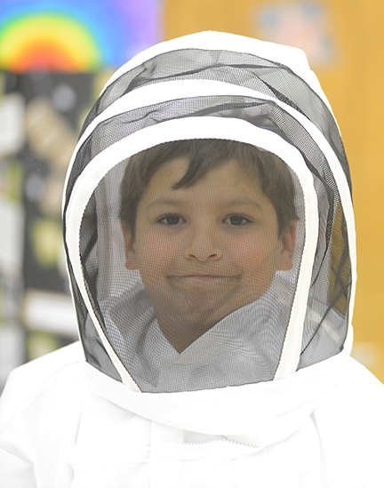 Beekeeper Nathaniel Haddon, 9. (Photo by Kathy Keatley Garvey)