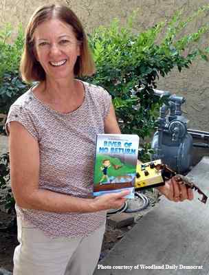 Rachael Long and her book. (Photo courtesy of Woodland Daily Democrat)