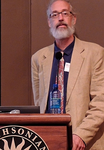 Scott Carroll speaking at the Smithsonian.
