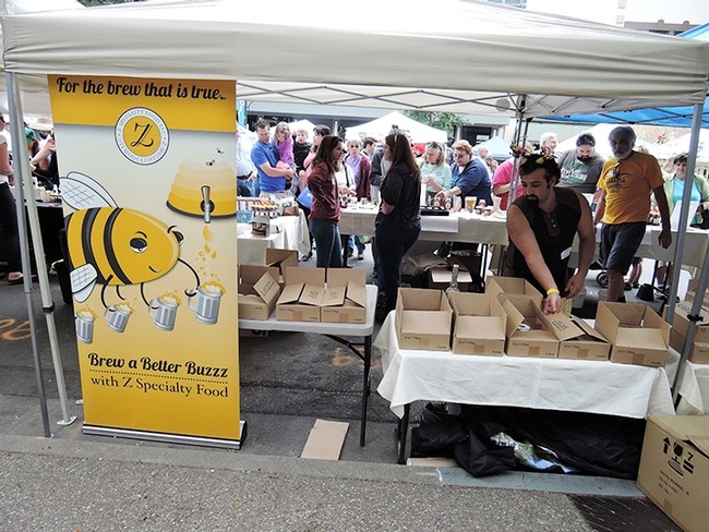 Owners of Z Specialty Food, Woodland, were as busy as well...bees. (Photo by Kathy Keatley Garvey)