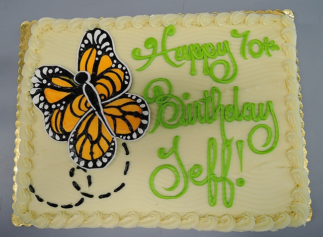 Entomologist Jeff Smith's 70th birthday cake featured a monarch butterfly motif. A 30-year volunteer at the Bohart Museum of Entomology, he curates the butterfly and moth collection.  (Photo by Kathy Keatley Garvey)