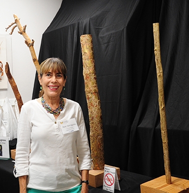 UC Davis Department of Design emeritus professor and environmental artist Ann Savageau, showcased her wood sculptures patterned with bark beetle galleries. (Photo by Kathy Keatley Garvey)
