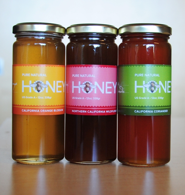 You can buy honey for your honey or for yourself from the UC Davis Honey and Pollination Center. Pictured are  orange blossom honey, wildflower honey and corinader (cilantro) honey. (Photo by Kathy Keatley Garvey)