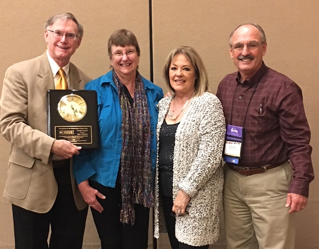 Eric and Helen Mussen (at left) of Davis with Gene and Christine Brandi of Los Banos at the American Beekeeping Federation conference in Reno. Gene Brandi presented Eric Mussen with the Founders' Award from the  Foundation for the Preservation of Honey Bees.
