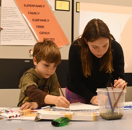 Insect enthusiasts and 4-H'ers Addie Angle, 13, and her brother, Dalton, 6, who are enrolled in entomology projects in the Misty Mountain 4-H Club, work on their dragonfly art. (Photo by Kathy Keatley Garvey)
