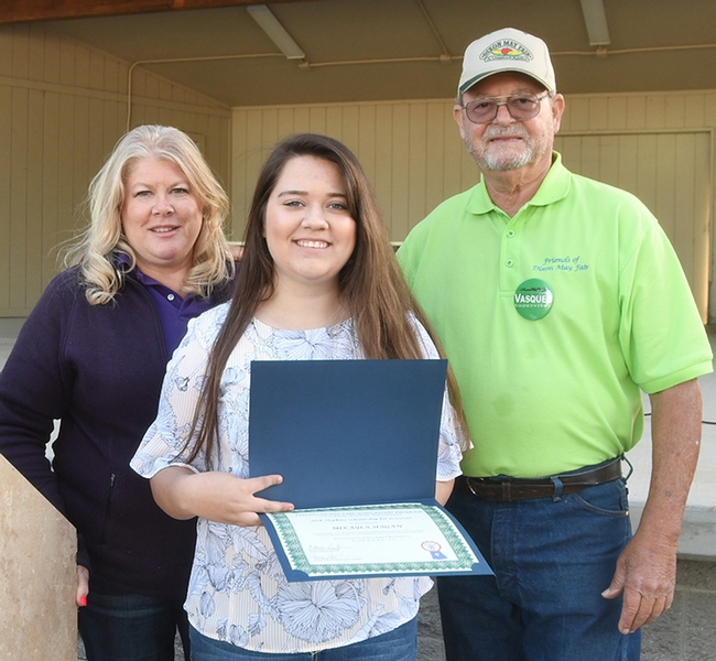 Fast forward to today: Mikayla Hagan (center) is the recipient of a college agricultural scholarship from the Friends of the Dixon May Fair. With her are scholarship chair Carrie Hamel of Dixon and Friends of the Fair president Donnie Huffman of Vacaville. (Photo by Kathy Keatley Garvey)