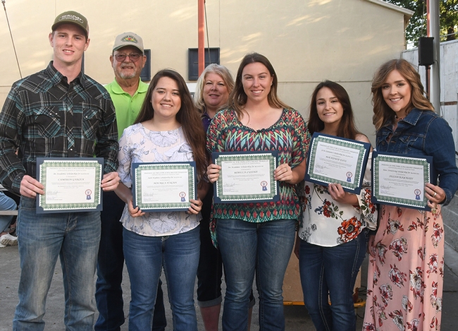 Six college scholarship winners received a total of $11,250 from the Friends of the Dixon May Fair in 2018, totaling $186,250 in college scholarships awarded since 2000.  In front (from left) are Cameron Garlick of Dixon, Makala Hagan of Rio Vista, Mackenzie Davi of Dixon,  Rebecca Luedke of Dixon, and Jillian Raycraft of Dixon. In back are Donnie Huffman of Vacaville, president of the Friends of the Fair, and Carrie Hamel of Dixon, scholarship chair. Not pictured is scholarship recipient Halie