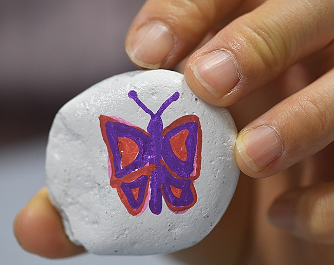 What's a rock without a butterfly on it? (Photo by Kathy Keatley Garvey)