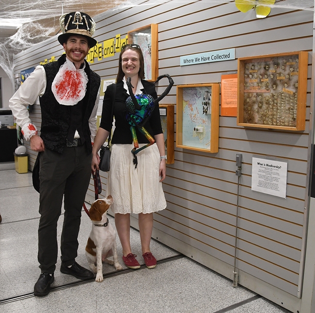 UC Davis entomology doctoral candidate Charlotte Herbert Alberts and her husband, George, pose with their Brittany Spaniel, Westley. (Photo by Kathy Keatley Garvey)