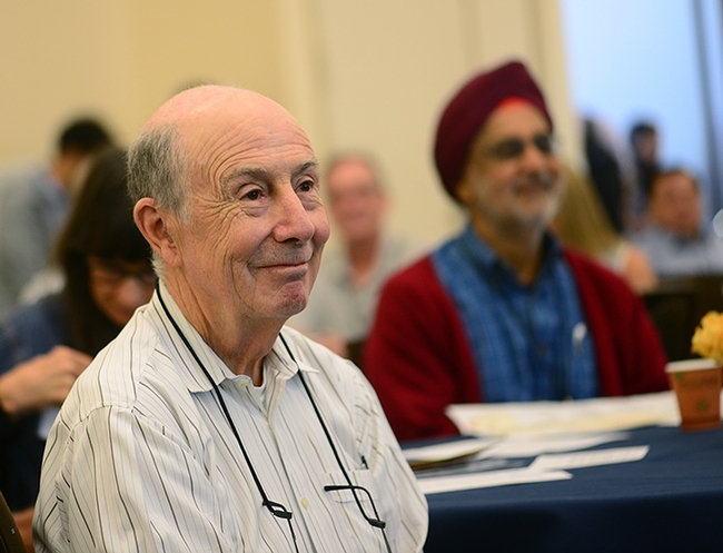 Bruce Hammock smiles as he receives accolades. In the back is his longtime friend Sarjeet Gill, distinguished professor at UC Riverside. They co-discovered an enzyme, epoxide hydrolase during their graduate studies at UC Berkeley. (Photo by Kathy Keatley Garvey)