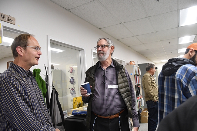 Don Miller (left), professor at Chico State University and butterfly hobbyist and ecological restorer Jeffrey Caldwell share knowledge. (Photo by Kathy Keatley Garvey)