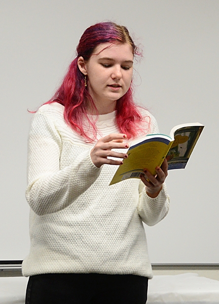 Elmira 4-H Club member Kailey Mauldin reads passages from the New York Times' bestseller, 