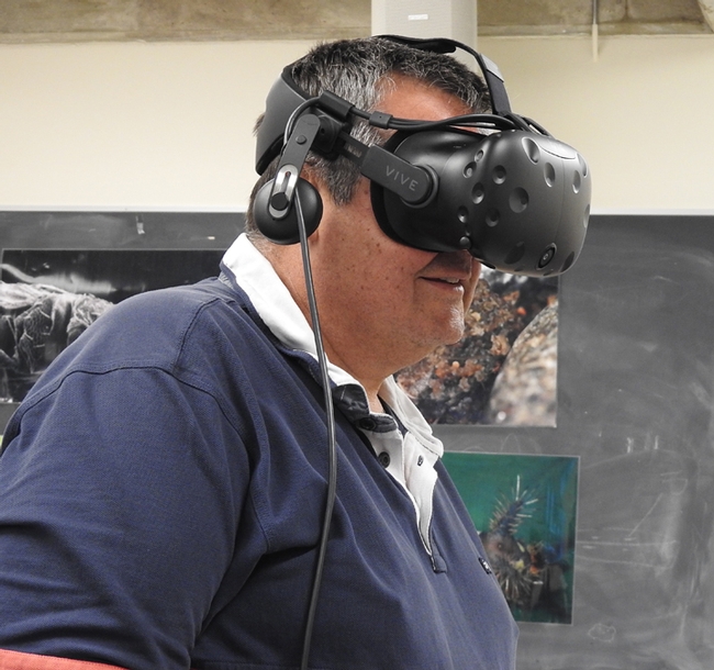 UC Davis alumnus Paul McClelland experiencing Virtual Reality Bugs. (Photo by Kathy Keatley Garvey)