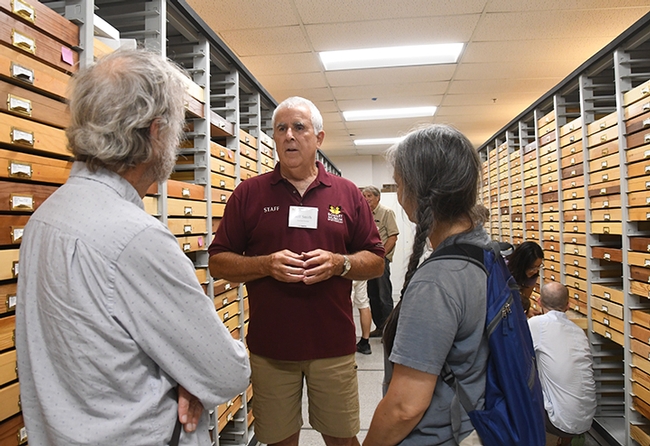 Lepitoptera curator Jeff Smith chats with visitors at last year's Moth Night at the Bohart Museum of Entomology. (Photo by Kathy Keatley Garvey)