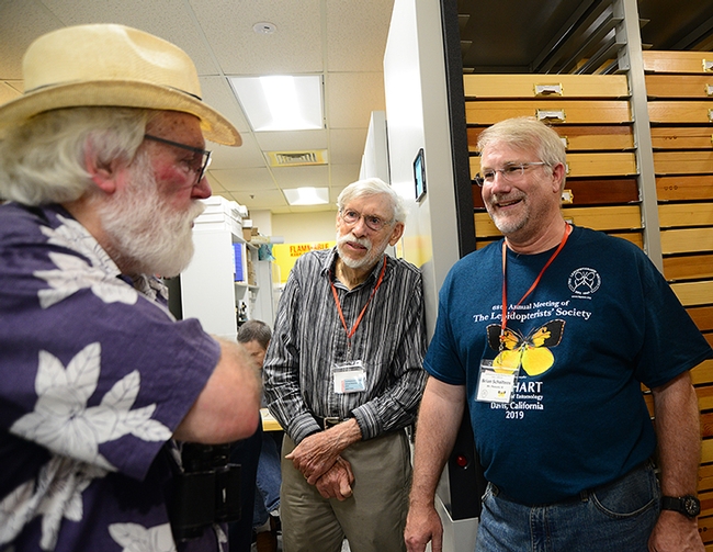 Entomologist Bill Patterson (center) of Sacramento and Lepidopterists' Society president Brian Scholtens, entomology  professor at the College of Charleston, South Carolina, discuss butterflies with scientist-author Robert Michael Pyle, founder of the Xerces Society for Invertebrate Conservation. (Photo by Kathy Keatley Garvey)