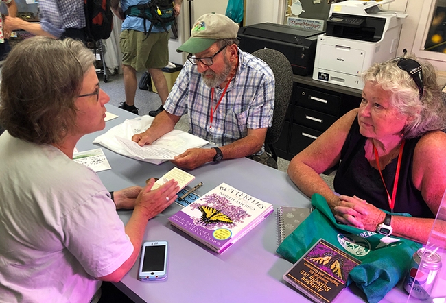 Fran Keller (left), assistant professor at Folsom Lake College, chats with Professor Paul Opler of Colorado State University and his wife, naturalist/nature photographer Evi Buckner-Opler. (Photo by Kathy Keatley Garvey)