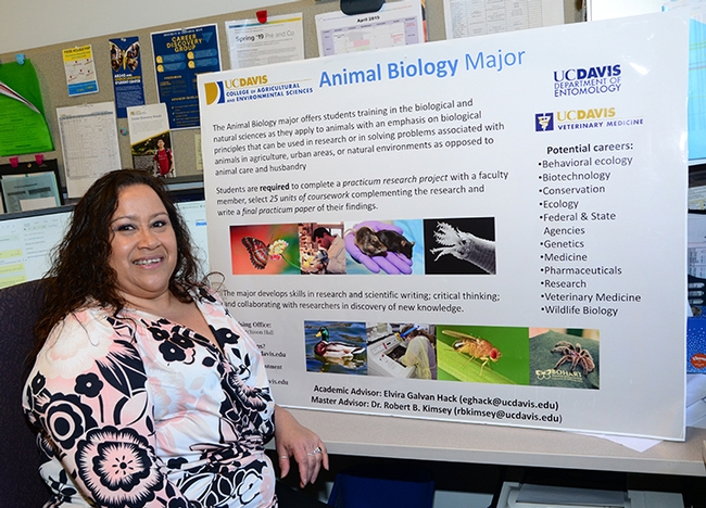 Elvira Galvan Hack with the animal biology program she created. (Photo by Kathy Keatley Garvey)