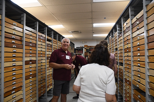 Entomologist Jeff Smith, who curates the Lepitoptera section, awaits visitors. (Photo by Kathy Keatley Garvey)