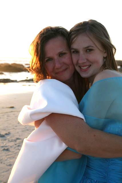 Entomologist Fran Keller (left) and daughter Rachael deVries share a hug on the beach after Fran's recent wedding to entomologist Pat Randolph. Yes, Fran collected insects along the beach. (Photo by Cory Unruh)