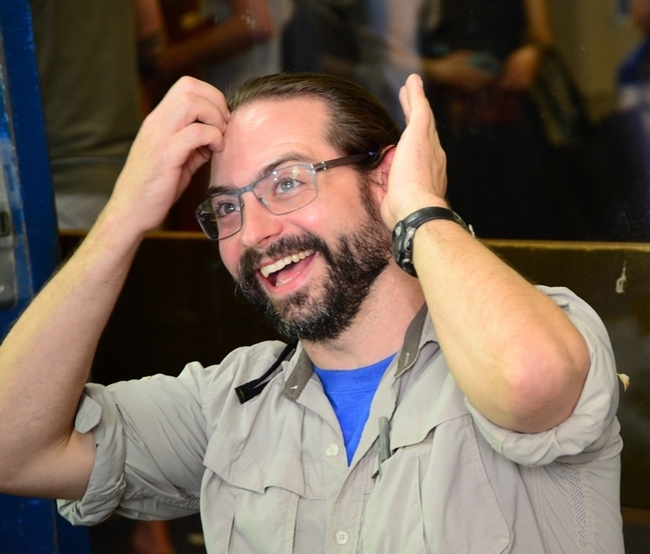 Brendon Boudinot reacts after listening to a question at the Entomological Society of America's Linnaean Games, now the Entomology Games. (ESA Photo)