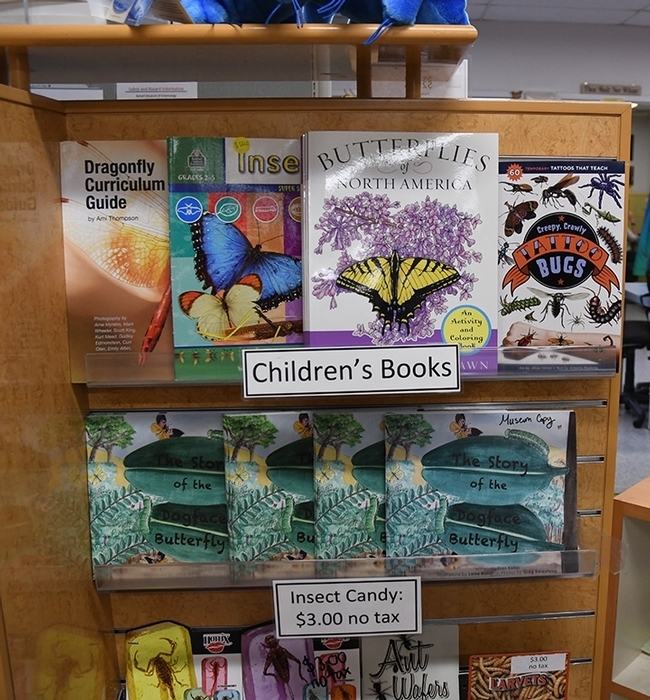 Books for all ages are shelved in Bohart Museum's gift shop, now online. (Photo by Kathy Keatley Garvey)