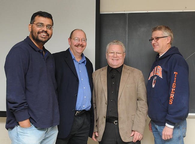 Renowned organic chemist Wittko Francke met with UC Davis researchers following his Dec. 8, 2010 presentation. From left are chemical ecologist Zain Syed of the Walter Leal lab; chemical ecologist and forest entomologist Steve Seybold (1959-2019) of the USDA Forest Service, Pacific Southwest Research Station, and the UC Davis Department of Entomology and Nematology; and UC Davis chemical ecologist Walter Leal. (Photo by Kathy Keatley Garvey)