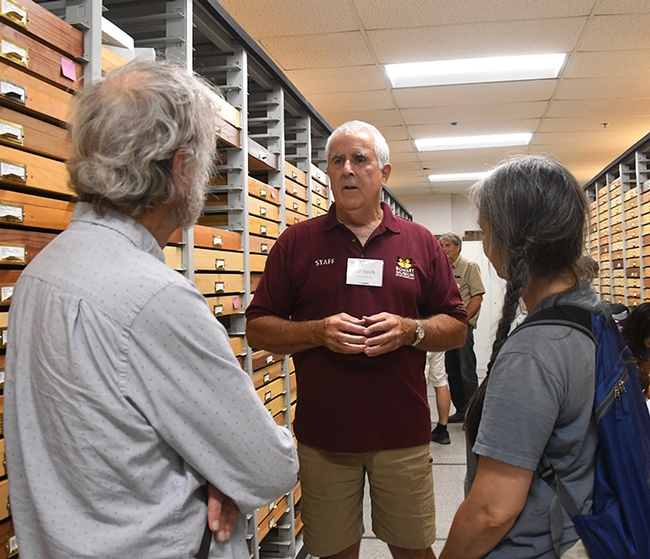 Entomologist Jeff Smith (center) discusses the difference between moths and butterflies at a Bohart Moth Night. (Photo by Kathy Keatley Garvey)