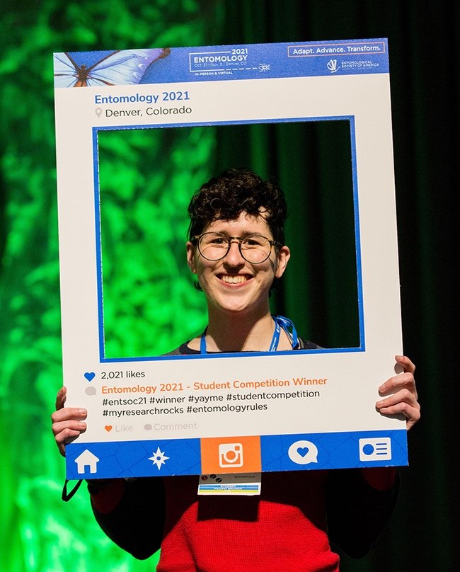 UC Davis doctoral student Danielle Rutkowski--framed--as the winner of a President's Prize at the Entomological Society of America meeting. (Photo by Entomological Society of America/Photography G)