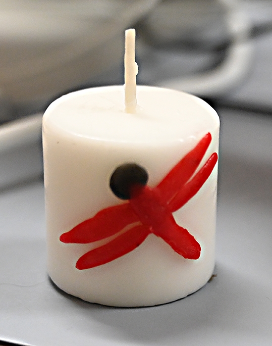 This dragonfly candle features a flameskimmer, Libellula saturata. (Photo by Kathy Keatley Garvey)