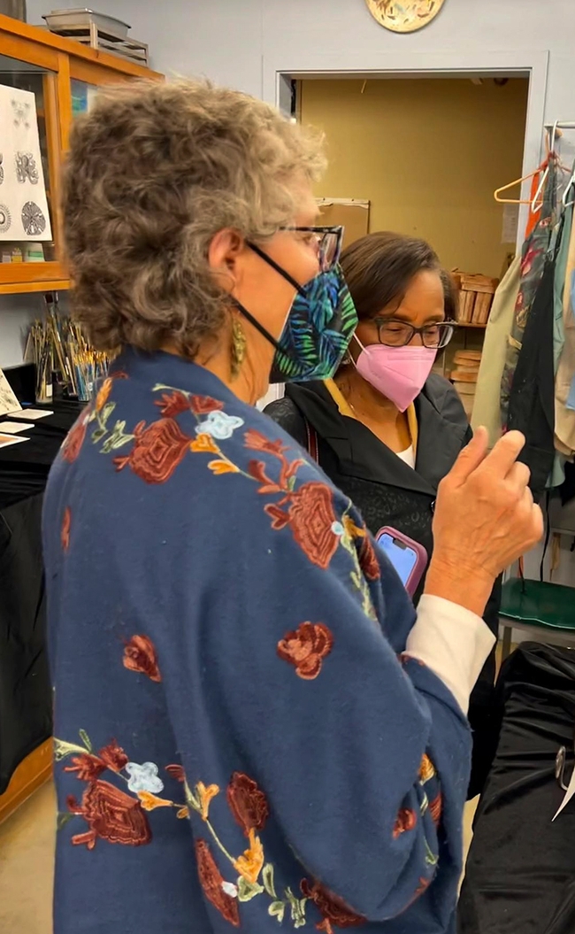 UC Davis distinguished professor Diane Ullman (left), an artist and an entomologists, converses with Helene Dillard, dean of the UC Davis College of Agricultural and Environmental Sciences. (Photo by Jenella Loye)