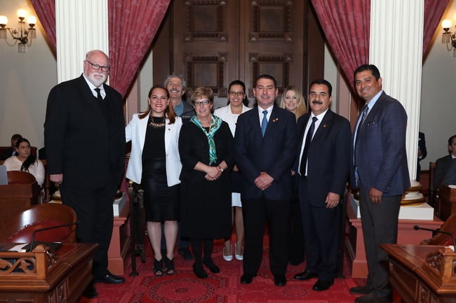 California State Senator Ben Hueso (far right) presented a resolution to Mexican dignitaries and UC ANR 4-H leadership. Pictured, left to right front row, are State Senator Jim Beall (15th District), Hortencia Medellin, Lupita Fabregas, Manuel Valladolid Seamanduras and Carlos Orozco. Back row, left to right, are Mark Bell, Claudia Diaz Carrasco and Shannon Horrillo.