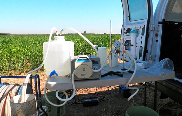 Water sample set-up for concentrating microbes. Photo by C. Nobile.