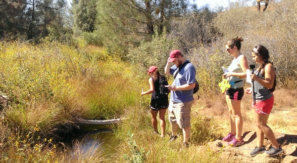 Undergraduate students surveying habitat at Red Hills. Photo by Matt Cover.