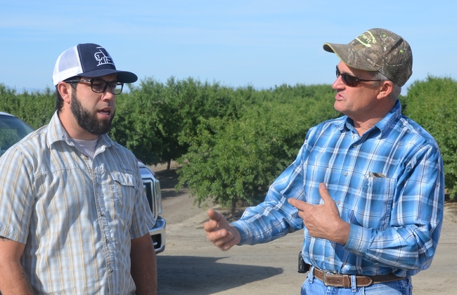 Geoff Koch (left) meeting Mendota farmer, Gary Martin.