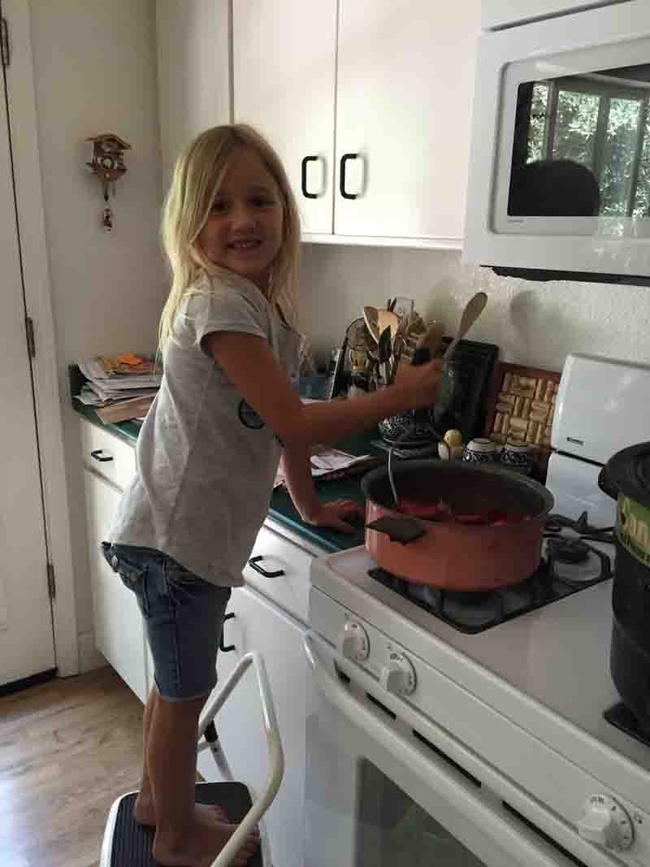 Kids are happy to help itwh jam making, for example stirring strawberry jam, as in this photo. Debi Durham