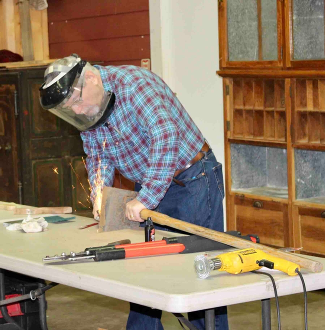 Rob Fanno desmonstrates use of a dremel sharpening tool at a Master Gardener workshop. Michelle Graydon