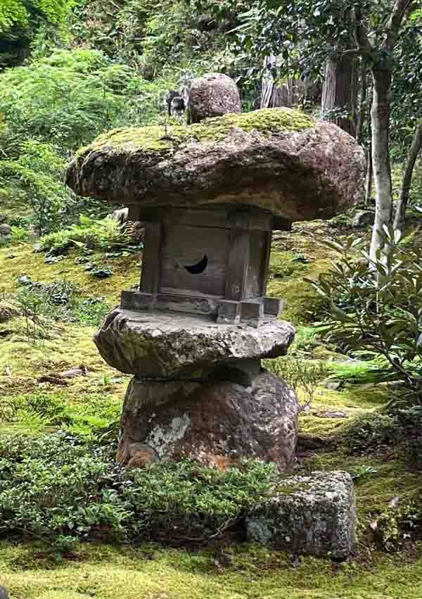 Stone lantern amid the moss at Sanzen-in garden in Ohara, northern Kyoto. J.C. Lawrence