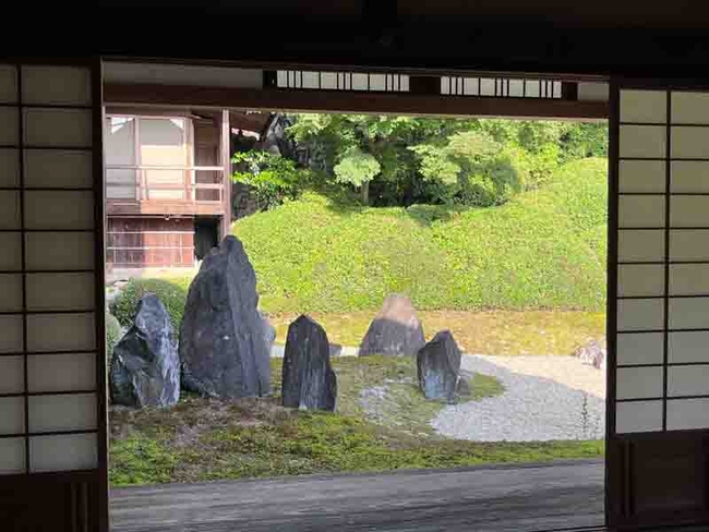 Garden scene  framed by building doorway at Komyo-in temple, Kyoto. J.C. Lawrence