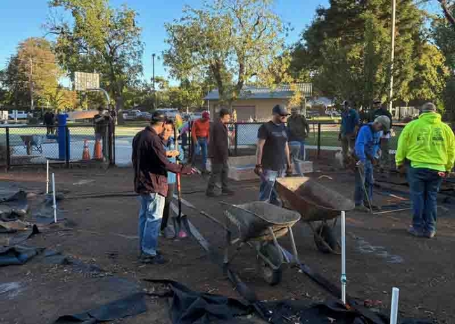 The Chico Noon Rotary Club starts work on raised beds at Chapman Park Community Garden. Joyce Hill